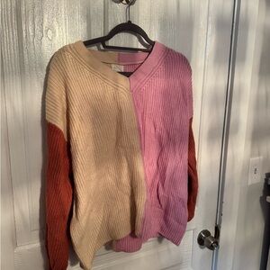 Pink and Cream V-Neck Sweater with Bold Color Blocks